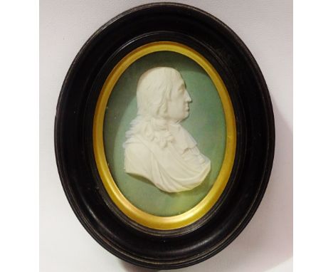 Wedgwood Miniature - 'Milton' (1608-1674) poet, an oval relief green jasperware portrait, marked verso, overall size 16 x 13c