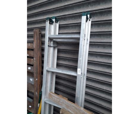 A set of extending aluminium step ladders 