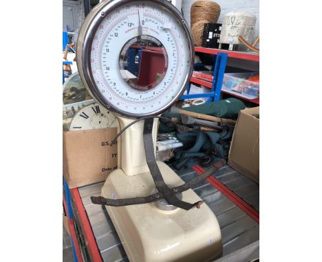 A cream coloured Marsdens weighing scale 