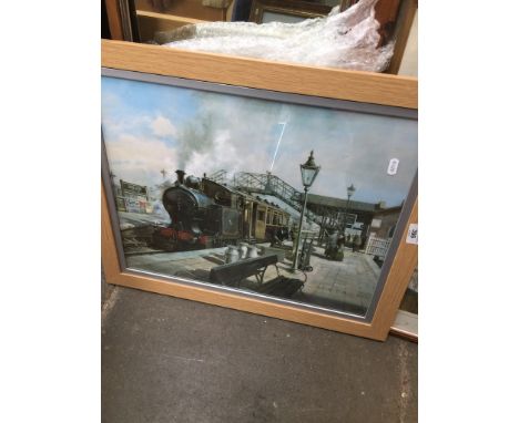 A framed and glazed print of a steam engine by Petrie 