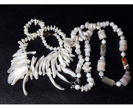 Two mother of pearl necklaces. 