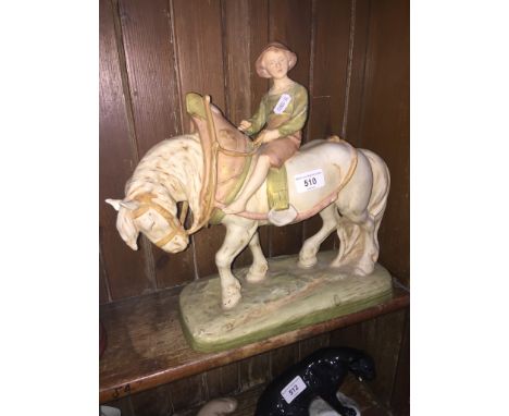 Royal Dux figure - boy on a horseTwo chips to ears and crack to base, missing item to hand, crack/imperfection to reins, heig
