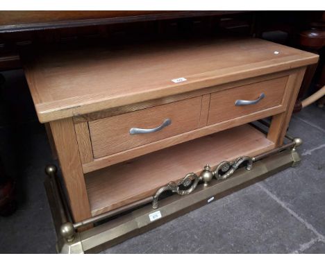 A modern light oak coffee tableDimensions: H47cm, W90cm, D55cm.