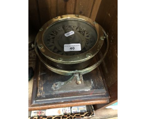 A ships compass on wood plinth - N.V. Observator, Rotterdam. 