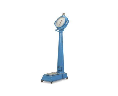 A TURQUOISE PAINTED CAST IRON PENNY SLOT WEIGHING MACHINE EARLY 20TH CENTURY Labelled Brecknells 'Minor' Birmingham, 'A Guide