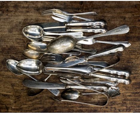 Seven silver teaspoons, 3.36 ozt approx; six silver cake forks, 2.63 ozt approx, six silver handled butter knives, two pairs 