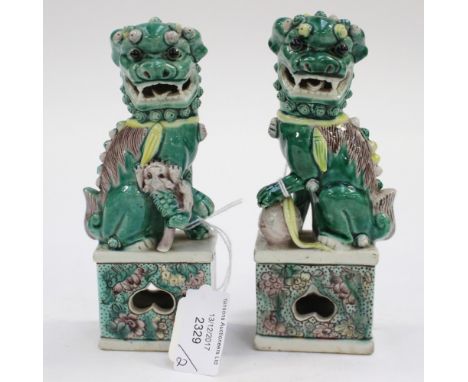 A pair of , late 19th Century, Chinese jade green figure of 'Dogs of Fo' (2)
