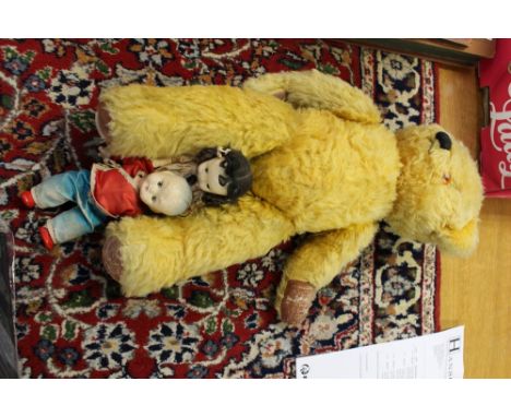 A Chad Valley teddy; together with a Mandarin doll and another 