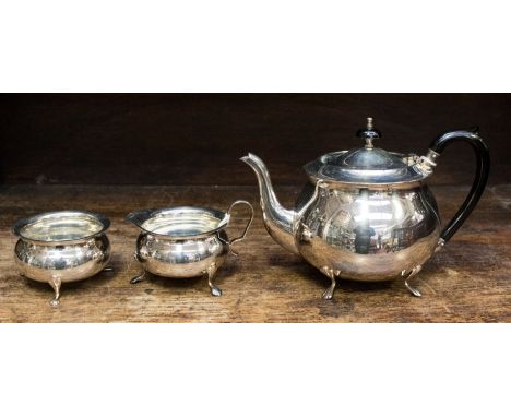 A silver plated three piece tea service, each piece supported on paw feet (3) 