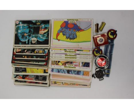 Collectors lot to include A and BC 1960s Batman Bubblegum cards, Anglo Confectionary Yellow Submarine cards and enamel badges