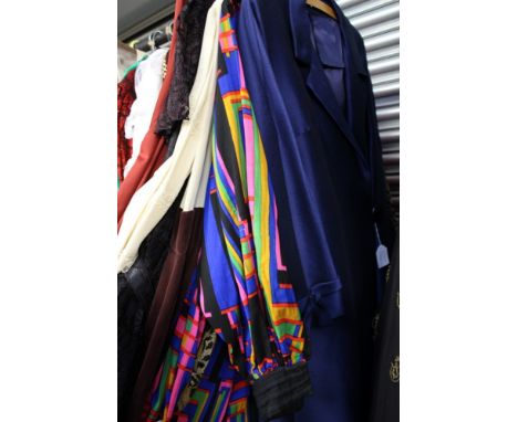 A Royal blue duster style coat, late 1950's early 1960's with large button fastenings, a brick red/tobacco silk jersey with a