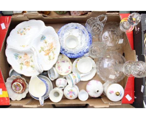 A small Meissen, floral decorated cup and saucer, together with two 19th Century globe decanters, flour blue plates and other