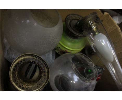 A box of assorted oil lamps and shades, including converted lamp, hand held lamp, etc.