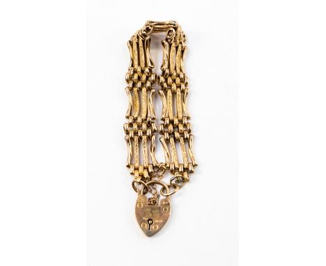 A 9ct gold ladies fancy link gate bracelet,  with a weight of approx 19.6 grams 