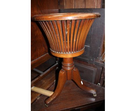 A 20th Century Regency style mahogany pedestal plant stand, the label to underside reading 'Hand crafted by Mines of Downley,