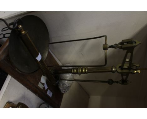 A 1902 Arts & Crafts copper crumb tray and an oil lamp base, together with an earlier brass plated crumb tray, no brushes (3)