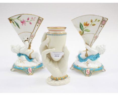 Royal Worcester hand and beaker vase and a pair of putti and jem vases, all a/f (3)