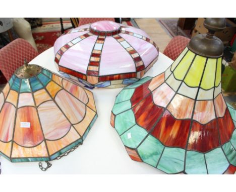 A very large Tiffany style pendant light shade, diameter approx 63 cm; together with two other large Tiffany style pendant la
