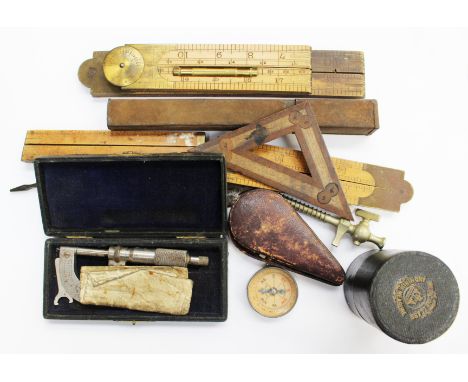 A collectors lot of small tools to include a British Railways Timken oil level indicator , a cased spirit level, a cased medi