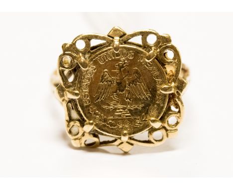 A 9ct gold ring set with coin type medallion, 3.3 grams approx 