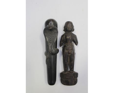 Ethnographica/Tribal Art interest: carved figure, possibly 19th Century; together with a parasol handle, possibly handle (2) 