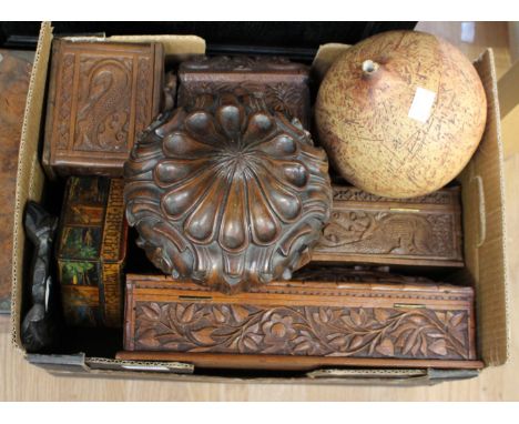 Four carved boxes, two with dragons carved to lid, one carved with a ram's head and dragon, one with flowers and foliage, tog