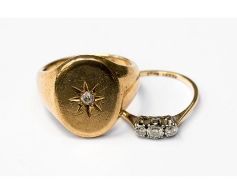  A 9ct signet ring with heavy oval mount, approx size 18mm x 14m, with a gypsy star set old cut diamond, size S, together wit