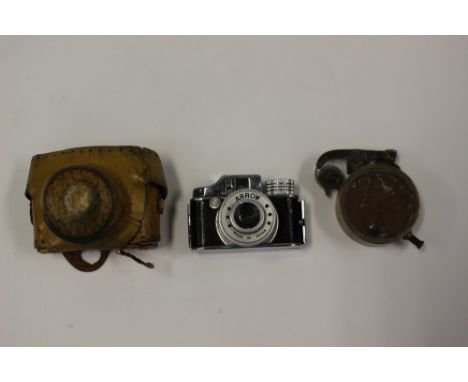 A Trench Art cigarette lighter with World War One and World War Two pennies; together with a miniature Japanese 'Arrow' camer