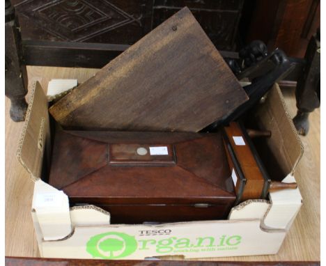 A George IV, mahogany sarcophagus tea caddy with key, on bun feet, together with an oak desk tidy with carrying handle, an eb