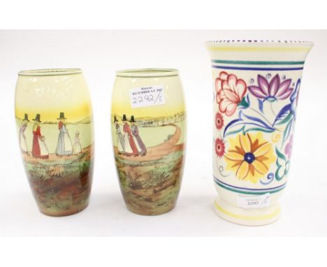 A pair of Royal Doulton Series ware vases, together with a Poole Pottery vase (3)