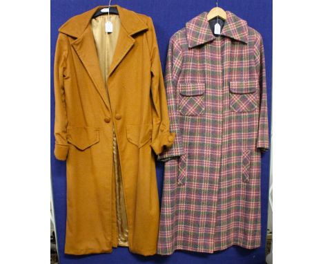A selection of coats to include a camel coat, a biscuit colour fur/sheepskin lined coat with patch pockets and two button fas