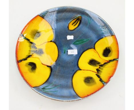 Poole Pottery charger with stylised yellow flowers, on a blue ground(1)
