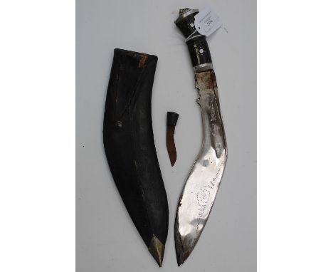 Indian made souvenir Kukri knife with 28cm plated blade with some decoration. One small knife only. Complete with scabbard.