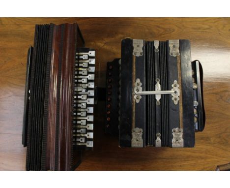 An Empress Accordion, together with another mahogany case and mother of pearl keys (2) 