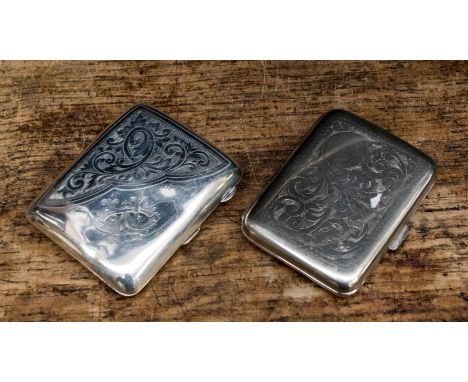 Silver cigarette case with chased foliate design and monogram to lid, Chester 1918/19, together with another plated, approx 5