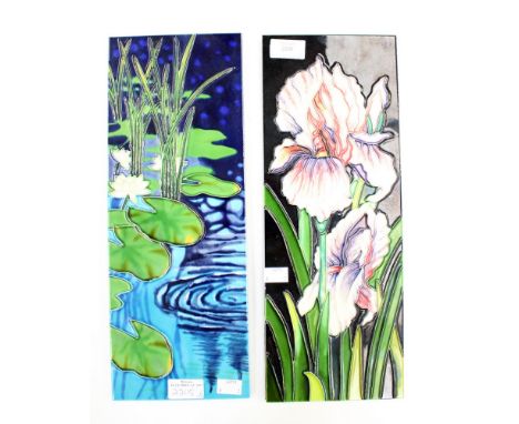  Two ceramic wall tiles in the style of Moorcroft, Water Lilies and Iris patterns, hand painted, tube lined, with hanging fit