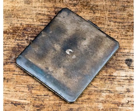 A silver cigarette case, gilt lined, weighing approx 4.49 ozt, Birmingham 1941 