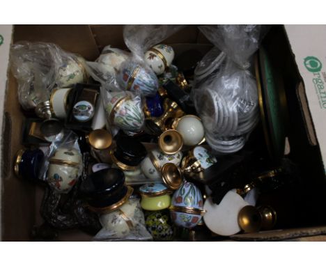 Quantity of enamelled trinket boxes, royal badges, two glass paperweights, two cloisonné plates, along with two metal greyhou