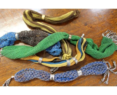 A collection of Misers purses (Victorian) to include five various, mustard/brown cream edged with bugle beads, deep blue/blac
