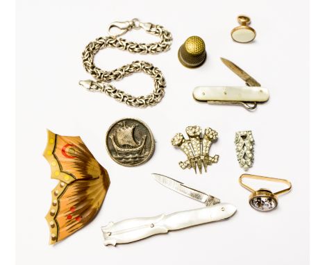 An Italian .925 silver bracelet, an Essex crystal style scarf/cravat ring, an Ionian silver brooch, a mother of pearl covered