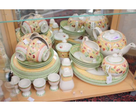  A comprehensive dinner, tea and breakfast service with four settings 'Covent Garden' Queens ceramics, with extras including 