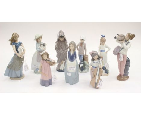 A collection of nine boxed Nao figurines: 00354; 00120; 01035; 01034; 01213; 00762; 00379; 00380 and 01156 (9)