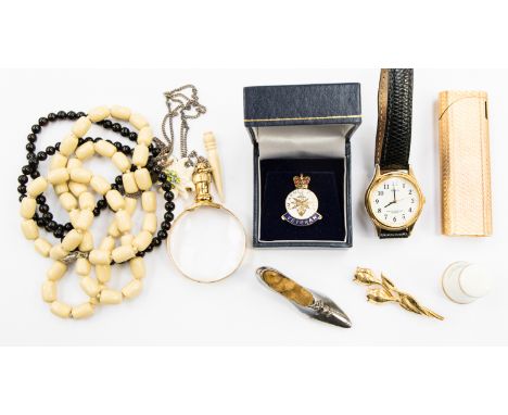 A parcel lot, to include a Japanese 18ct, gold plated Ma Uman  cigarette lighter,  a small shoe pin cushion, a Royal Worceste