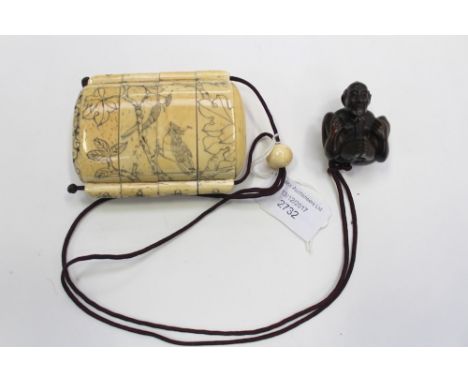 Japanese Inro and netsuke, the Inro being carved in bovine bone with erotic scenes, the hardwood netsuke being erotic carving