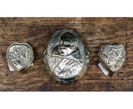 Two heart shaped embossed silver trinket pots, Birmingham 1900 and Birmingham indistinct date mark, with a larger silver trin