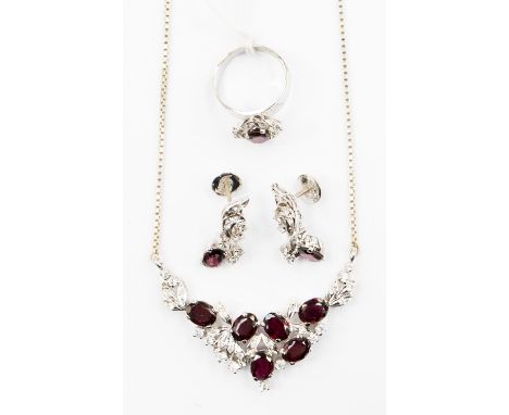 A 925 sterling and garnet type jewellery set, comprising a pendant set with oval stones along with a matching ring and earrin