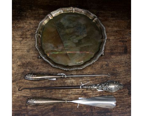 A Mappin & Webb footed silver tray, Sheffield 1904/05, together with a silver handled shoe horn, Birmingham, and two silver h