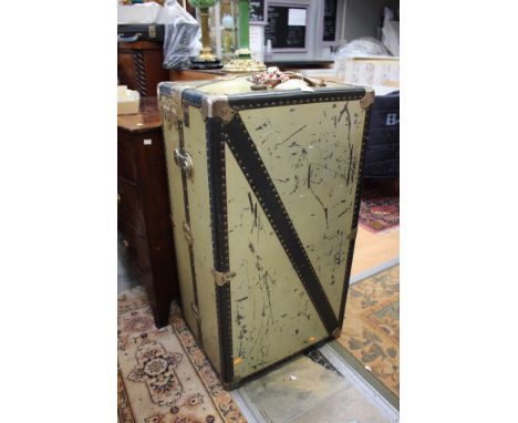 An early 20th Century cabin trunk, bearing the letters 'CFP' and retaining label reading 'Peninsular & Oriental Steam Navigat