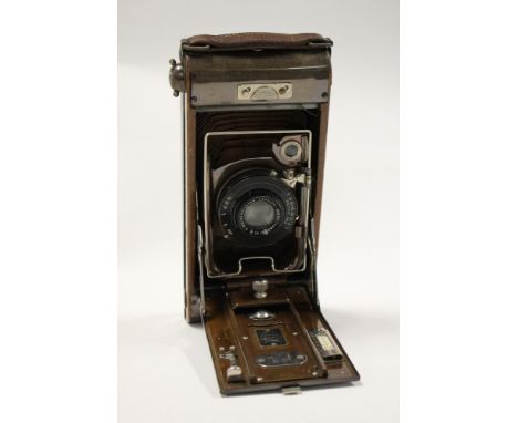 A vintage Ensign Carbine Tropical model, concertina camera in slip case 