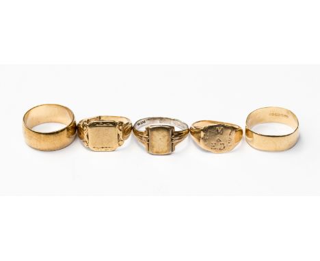 A group of four 9ct gold rings, and a yellow metal ring (lead solder) with a total combined  weight of approx 18.7 grams, som